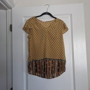 Maurice's yellow blouse